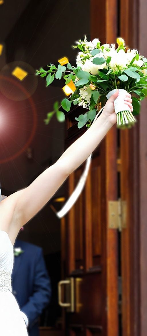 Happy married couple leaving the church after getting married