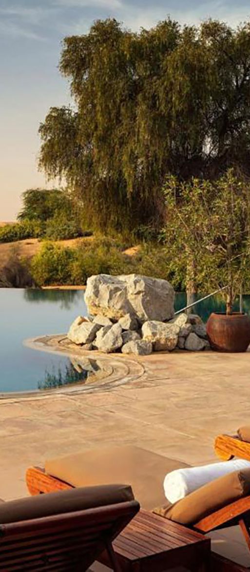 Pool area at desert resort in Dubai for mimimoon