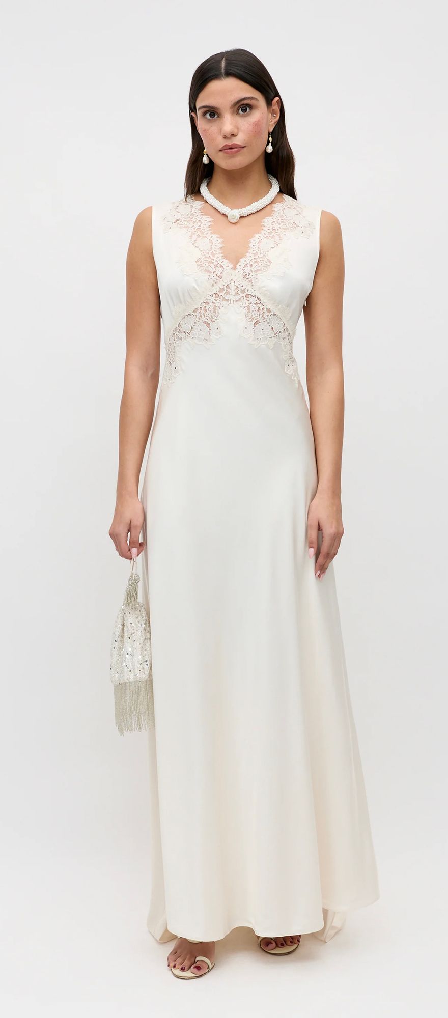 Satin pearl toned spring wedding dress with lace detailing