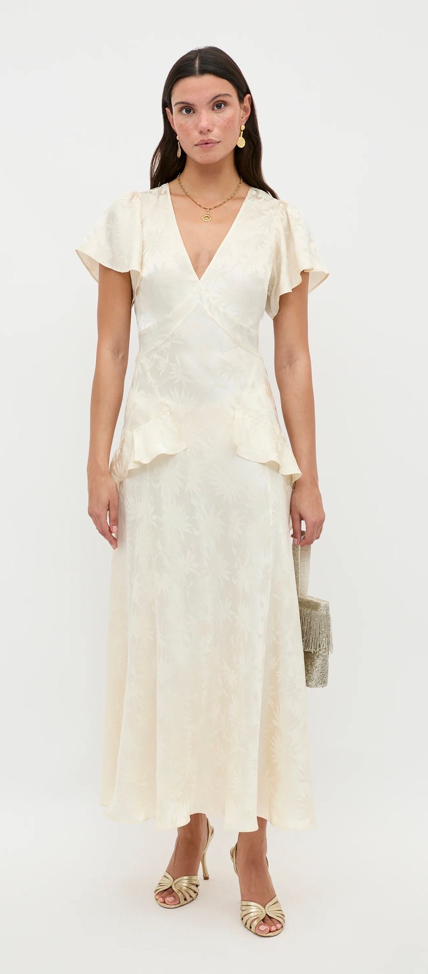 Champagne spring wedding dress with floral print and ruffled detailing