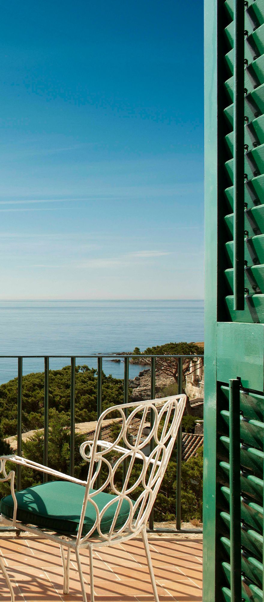 Private terrace with champagne and panoramic sea views at Hostal de La Gavina on the Costa Brava.