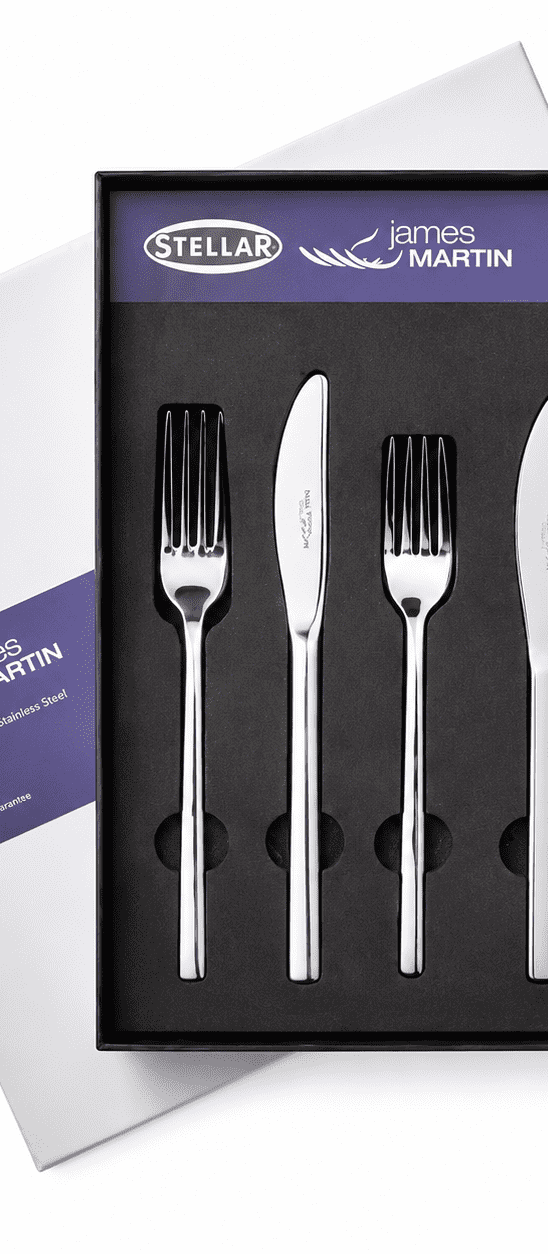 Boxed stainless steel cutlery set with forks, knives and spoons displayed on black tray.