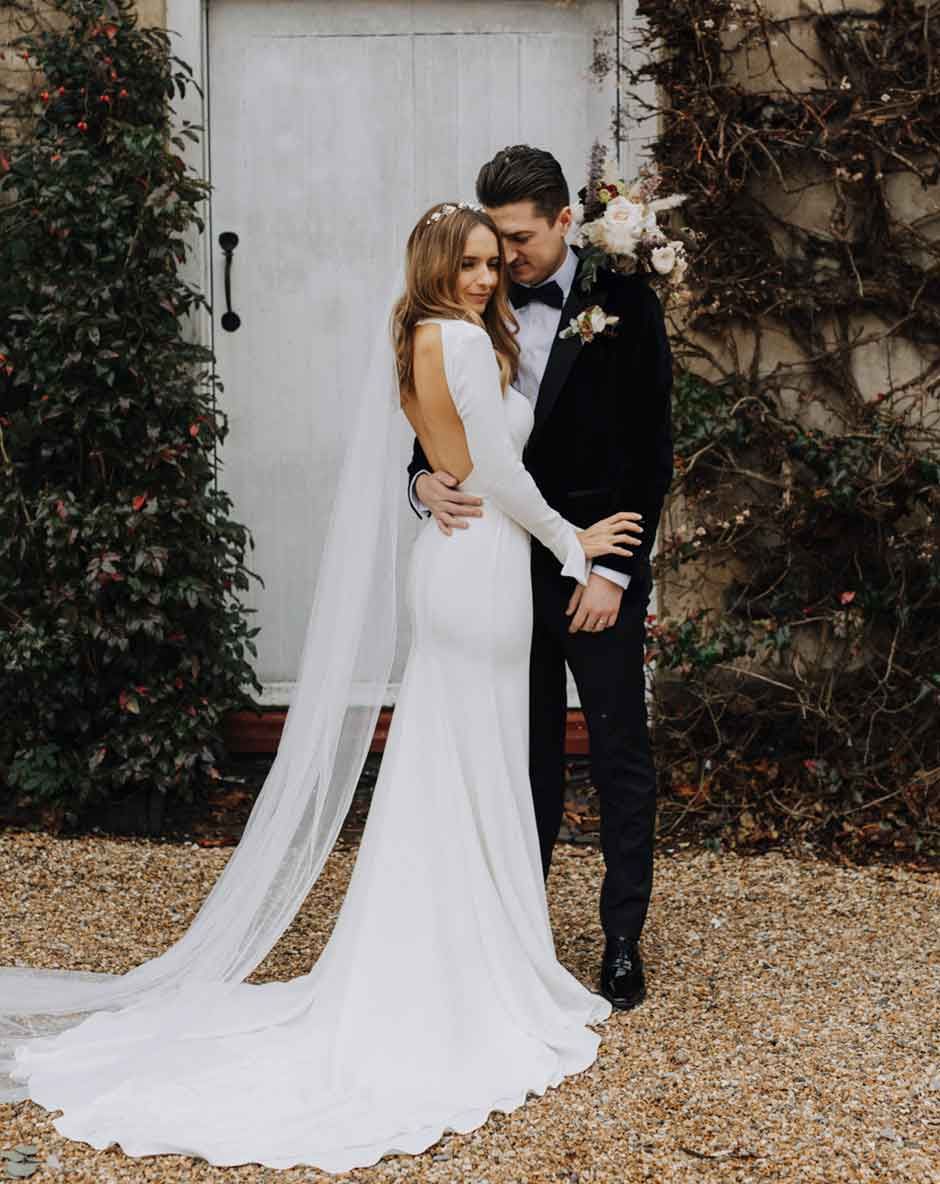 Emma Beaumont Wedding Dress for a Winter Wedding at Northbrook Park with Pampas Grass Floral Arrangements