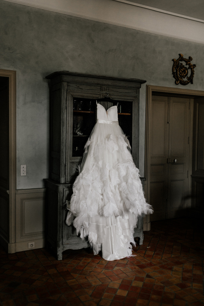 white feather wedding dress