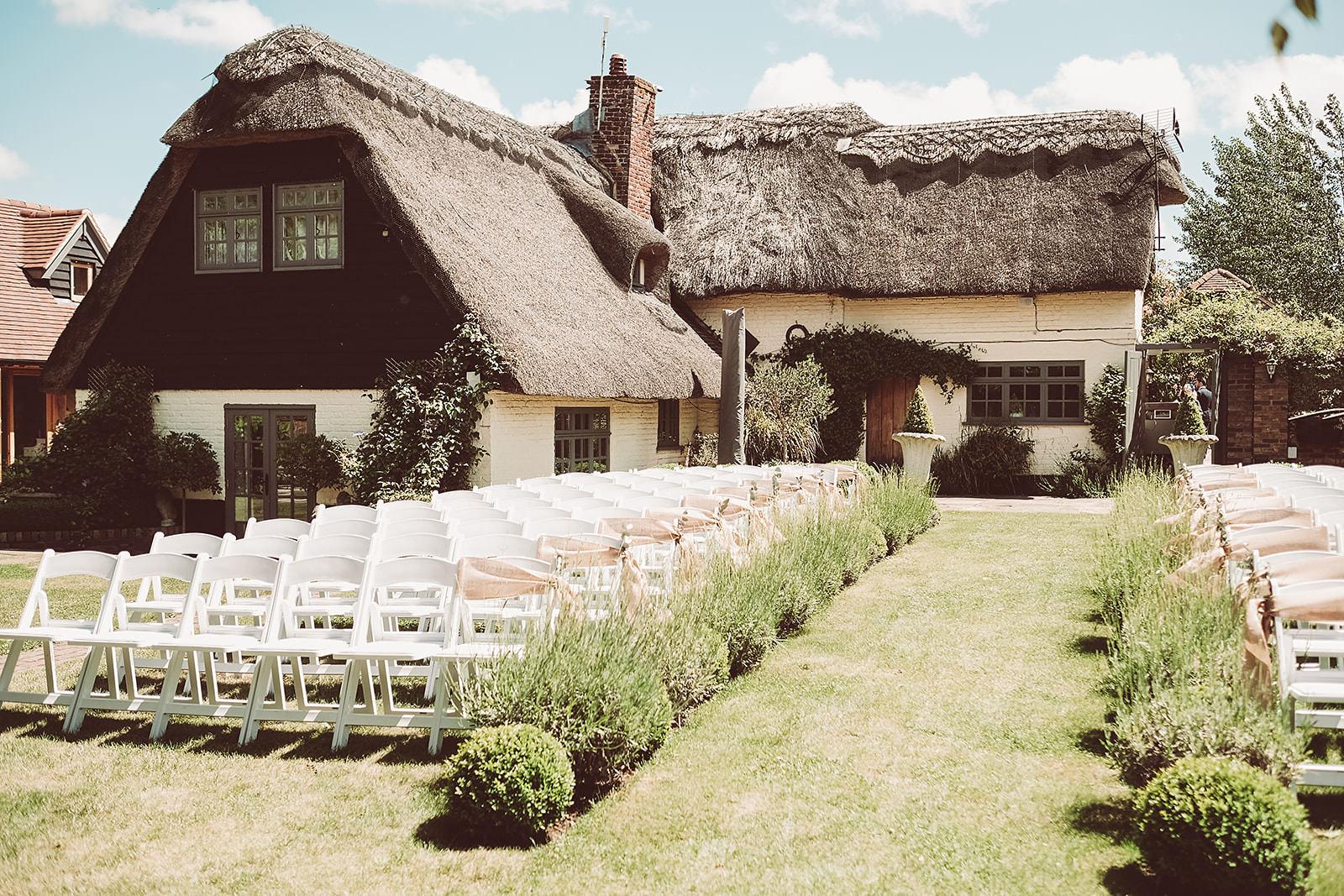 Kent Wedding Venue With Ferris Wheel And Homemade Doughnut Wall