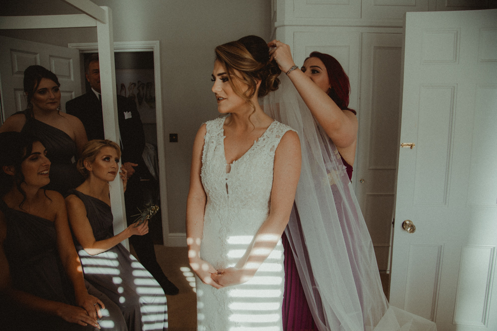 Bride in Lace Wedding  Dress  for a Black Tie Winter Wedding  